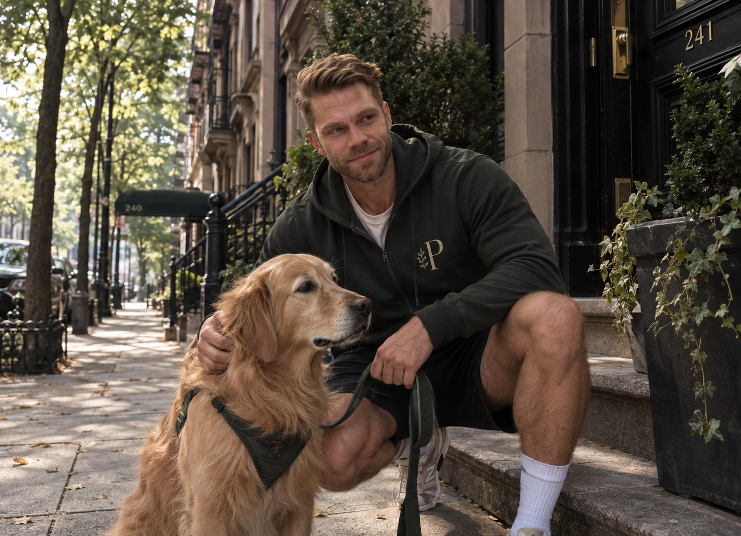 Brad sharing a quiet moment with a golden retriever on the Upper West Side